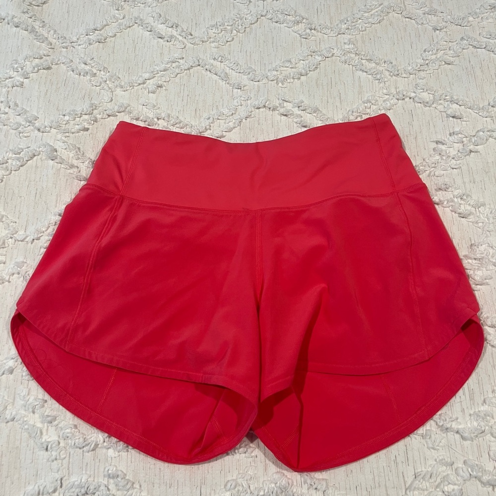 Lululemon high rise speed up shorts.